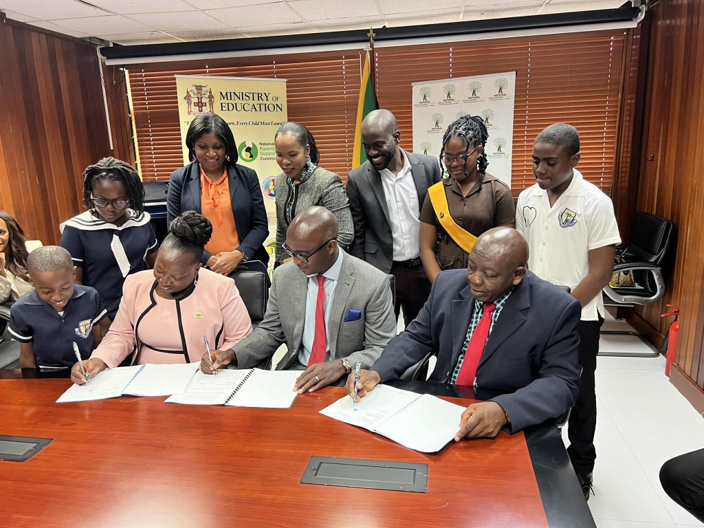 Signing Adoption of Savanna-la-Mar Primary School
